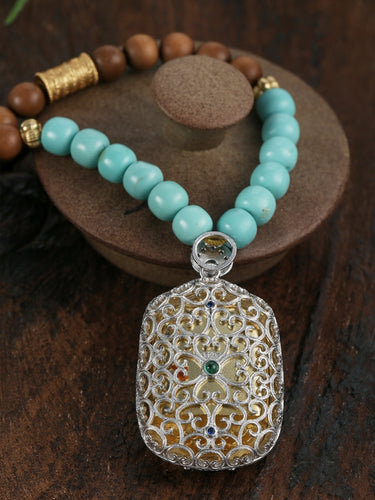 Sandalwood Talisman Bracelet – Protective Energy, Coral Buddha Pendant, Turquoise Beads
