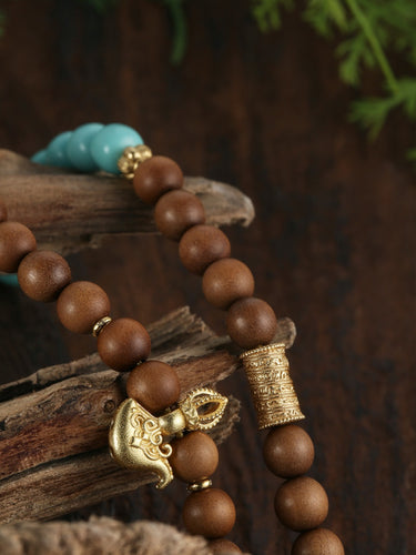 Sandalwood Talisman Bracelet – Protective Energy, Coral Buddha Pendant, Turquoise Beads