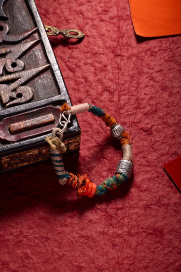 Himalayan Protection Charm Bracelet - Blessing Energy with Coral & Silver