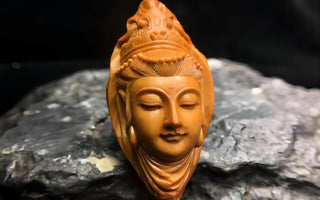 Discover the Symbolism and Meaning behind Guanyin Head Stone Statues 