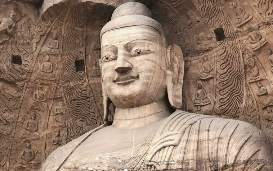 Yungang Grottoes Tryadhva-buddha Statue: A Historical Marvel