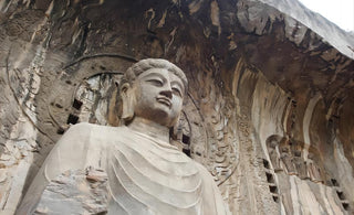 A Symbol of Wisdom: Grey Limestone Buddha Statues