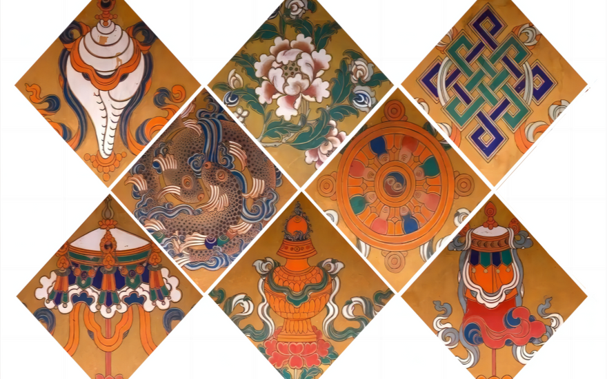 A point of focus for mediation and contemplation: the eight auspicious symbols placed on lotus pedestals in front of statues of the Buddha