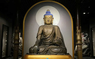A Point of Focus for Meditation and Contemplation: The Eight Auspicious Symbols Placed on Lotus Pedestals in Front of Statues of the Buddha