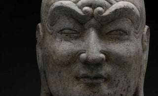 Symbolism and Spirituality: Grey Limestone Buddhas in the Tang Dynasty