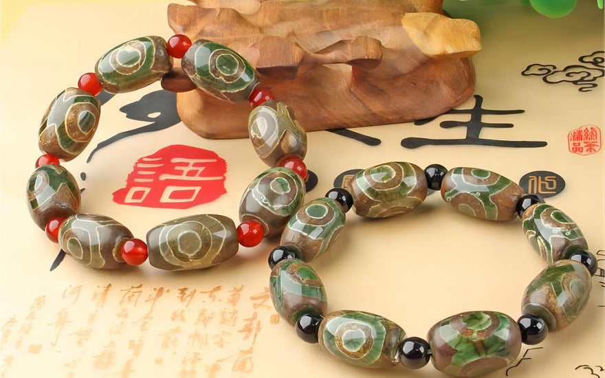Sacred Symbols: Exploring Tibetan Bracelets with Three-Eyed Dzi Beads