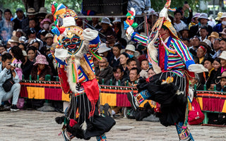 Embarking on a journey through the vibrant colors and age-old traditions of the Sho Dun Festival