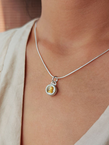 Circle of Serenity Pendant | Sterling Silver Charm with Gilded Buddha