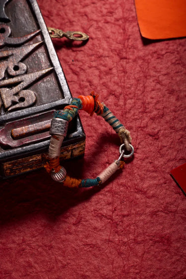 Himalayan Protection Charm Bracelet - Blessing Energy with Coral & Silver