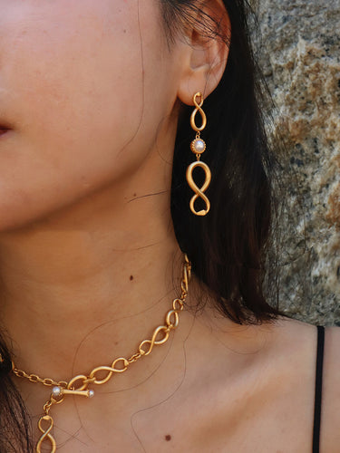 Infinity Serpent Earrings | Gold and Freshwater Pearl Drop Design